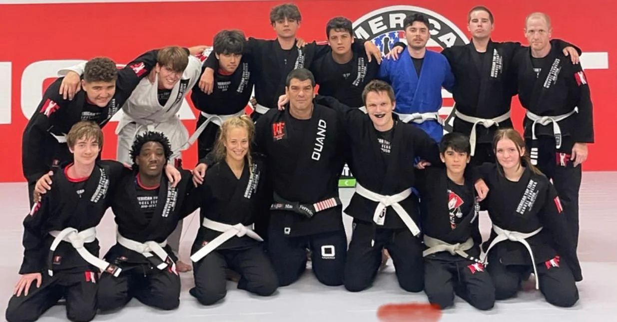 The American Top Team Winter Garden team with Coach Marcel Ferreira